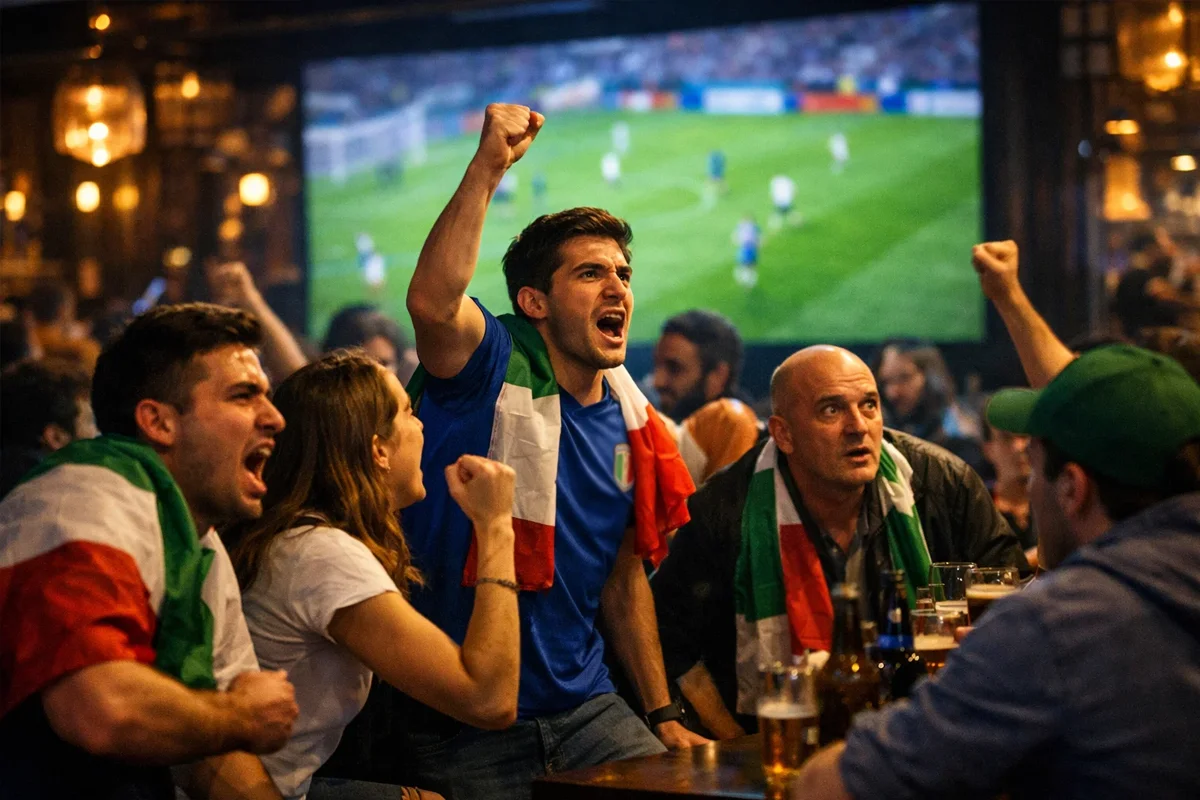 Tifosi esultano guardando partita di calcio su grande schermo in tempo reale